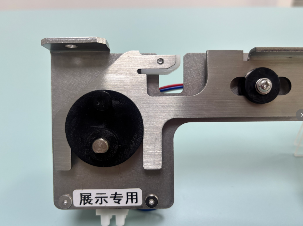 Centrifuge Self-Priming Door Lock Assembly